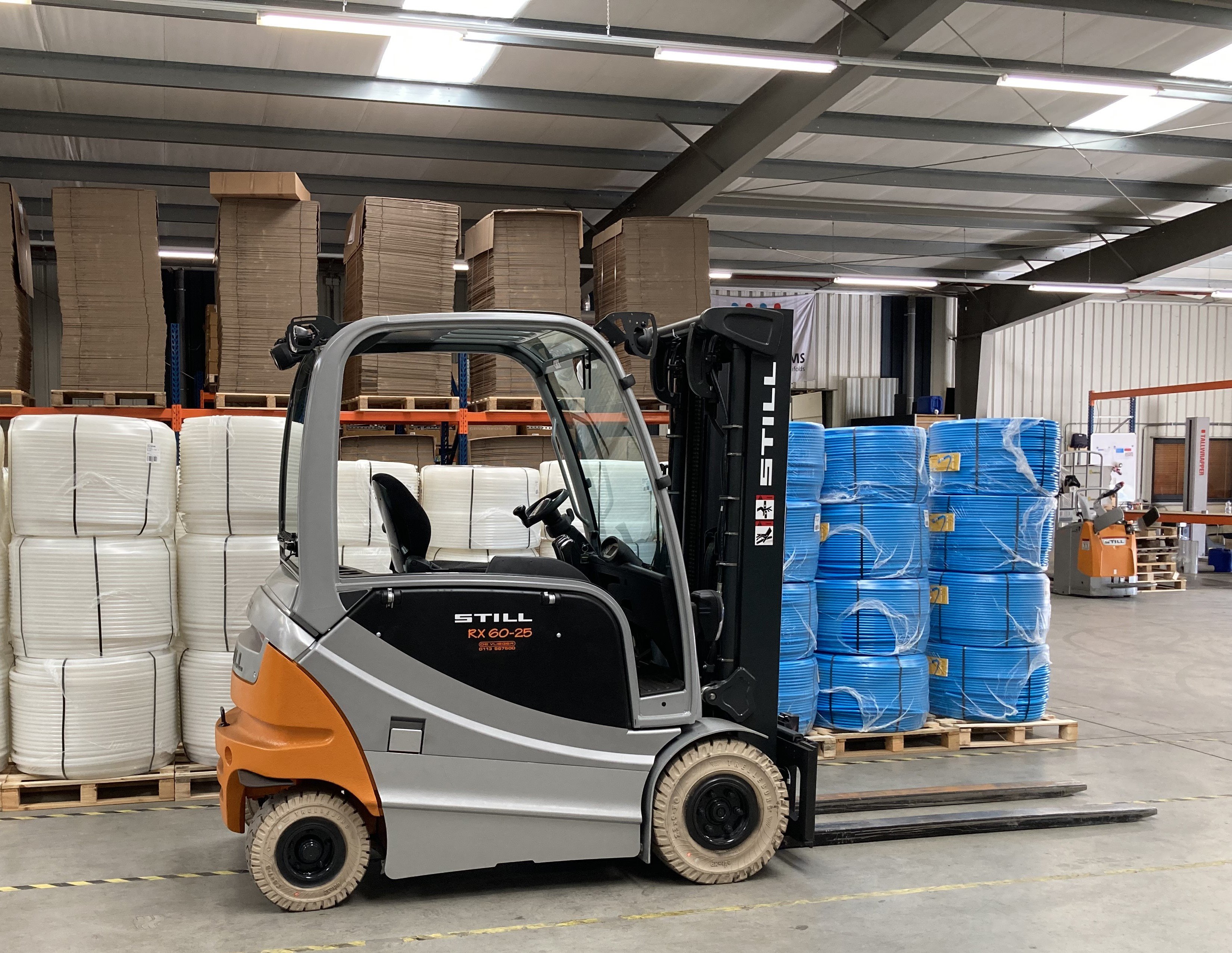 Gebruikte STILL RX 60-25 afgeleverd Tholen